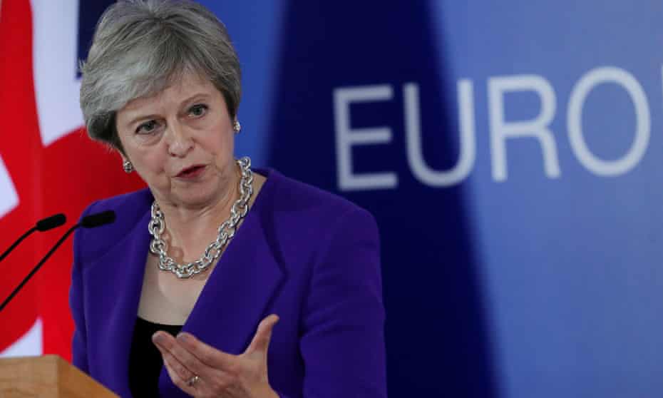 Theresa May holds a news conference at the EU leaders summit in Brussels.