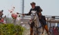 A horse rider smashes a watermelon during the Ethnosport Culture Festival in Istanbul