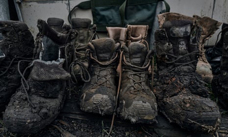Boots of wounded Ukrainian soldiers are placed near a medical point at the frontline in Bakhmut, Donetsk region, Ukraine.