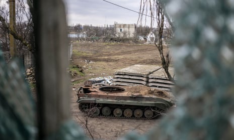 A damaged military vehicle is seen in Ukraine's Kherson region.