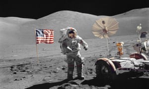 Eugene Cernan walks towards the Lunar Roving Vehicle (LRV)