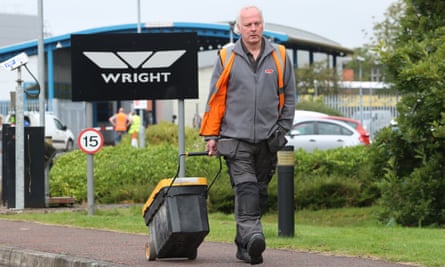 A worker leaving the Wrightbus factory in Ballymena last week.