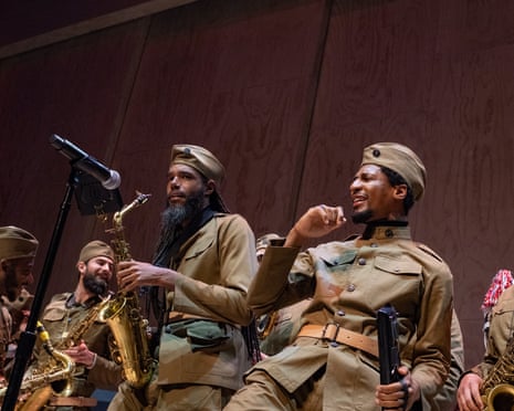Jon Batiste and the 369th Experience marching band. Soundtrack of America opens The Shed with a five-night concert series celebrating the unrivaled impact of African American music on contemporary culture with performances by today’s most exciting emerging musicians. Conceived and directed by Turner Prize-winning artist and Oscar-winning filmmaker Steve McQueen, and developed with music visionaries and academic experts, Soundtrack traces a musical “family tree” of spirituals and blues, jazz and gospel, R&B, rock and roll, house, hip hop, and trap that has inspired a new generation of artists who continue to develop that legacy. The McCourt, The Shed, New York