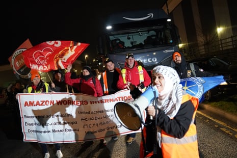 Amazon staff members on a GMB union picket line outside the online retailer’s site in Coventry