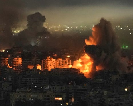 Smoke and flames rise from buildings after an Israeli airstrike in Dahiyeh, Beirut’s southern suburbs, on Wednesday