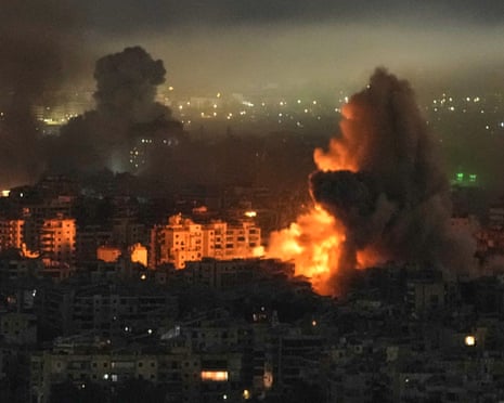 Smoke and flames rise from buildings following an Israeli airstrike in Beirut’s southern suburbs on Wednesday night.