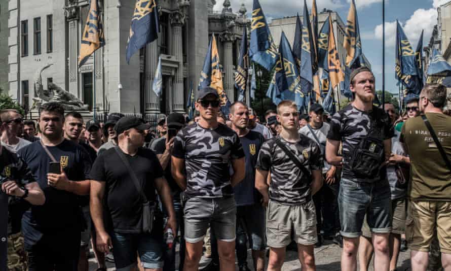 Soldiers, veterans and supporters of Azov Battalion hold a protest at the Ukrainian parliament in 2019. Some members of the group are involved in far-right MMA events
