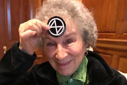 Canadian author Margaret Atwood holds up XR sticker.