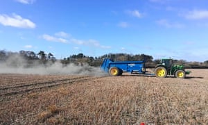 Crushed basalt is applied to an arable field in Norfolk as part of the research programme of the Leverhulme Centre for Climate Change Mitigation.