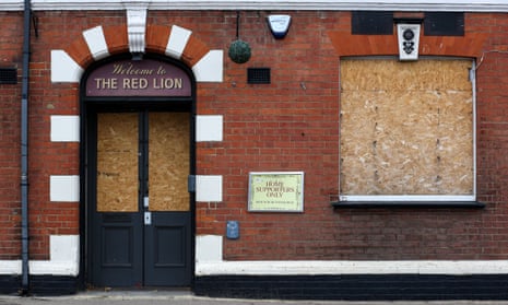 Boarded up pub