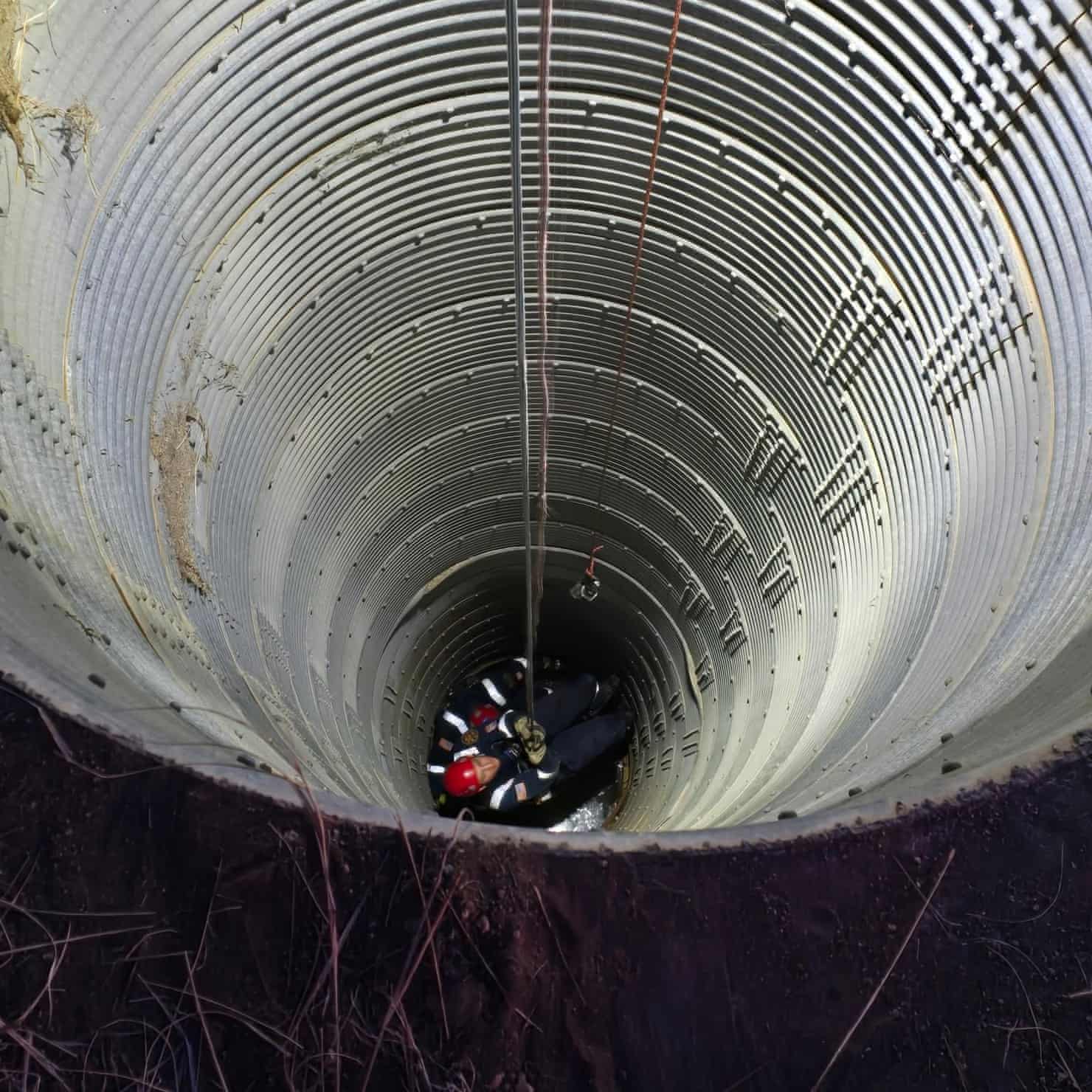 Teen rescued from silo