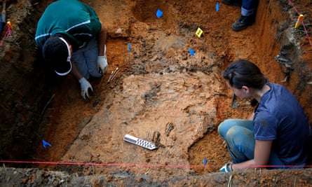 Anthropologists at the University of South Florida exhume a grave at the Arthur G Dozier School for Boys in 2013.