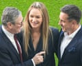 From left to right, Keir Starmer, Laura Woods and Gary Neville on the pitch