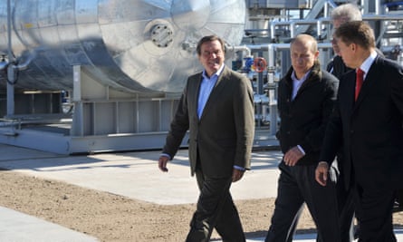 Vladimir Putin with then Gazprom CEO Alexei Miller (R) and former German chancellor Gerhard Schröder arriving for the inauguration of the Nord Stream project in 2011.