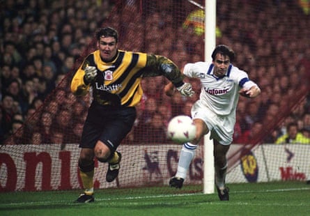 Nottingham Forest keeper Mark Crossley and Auxerre’s Corentin Martins sprint for a ball in the penalty area during their Uefa Cup match at the City Ground.