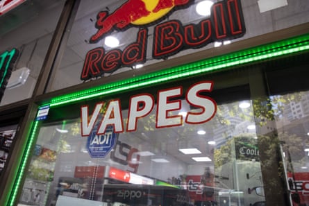 shop window with a Vapes sign