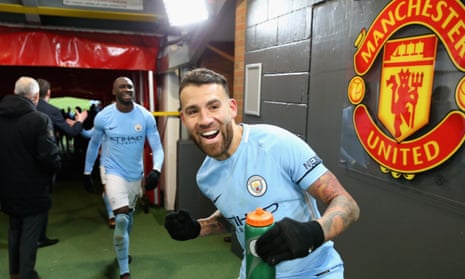 Manchester City’s Nicolás Otamendi celebrates in the Old Trafford tunnel before the clashes.
