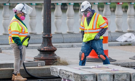Construction workers on the Arlington Memorial bridge over the Potomac River in Washington DC