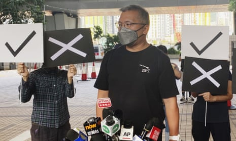 Ronson Chan speaks after his court appearance wearing a T-shirt emblazoned with ‘press freedom’.