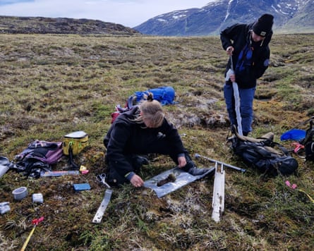 Sonja and Lucas Diaz collecting soil samples using various implements