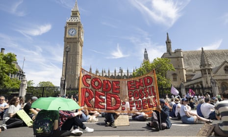 Climate protesters (not connected with the Climate party) demand government action in London on 23 July.  