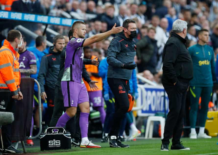 Tottenham’s Eric Dier draws attention to a medical emergency in the stands at Newcastle.