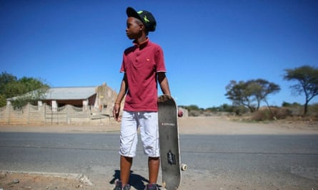 Gladwin Louw from South Africa, 14, one of six friends sharing one skateboard in South Africa