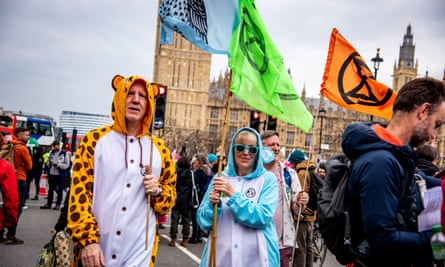 Protesters wearing fancy dress during march