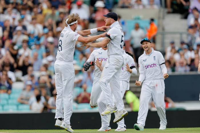 Broad celebrates with Stokes after taking the wicket of South Africa's Elgar.