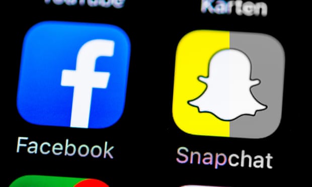 Smartphone screen with SnapChat and Facebook app icons.