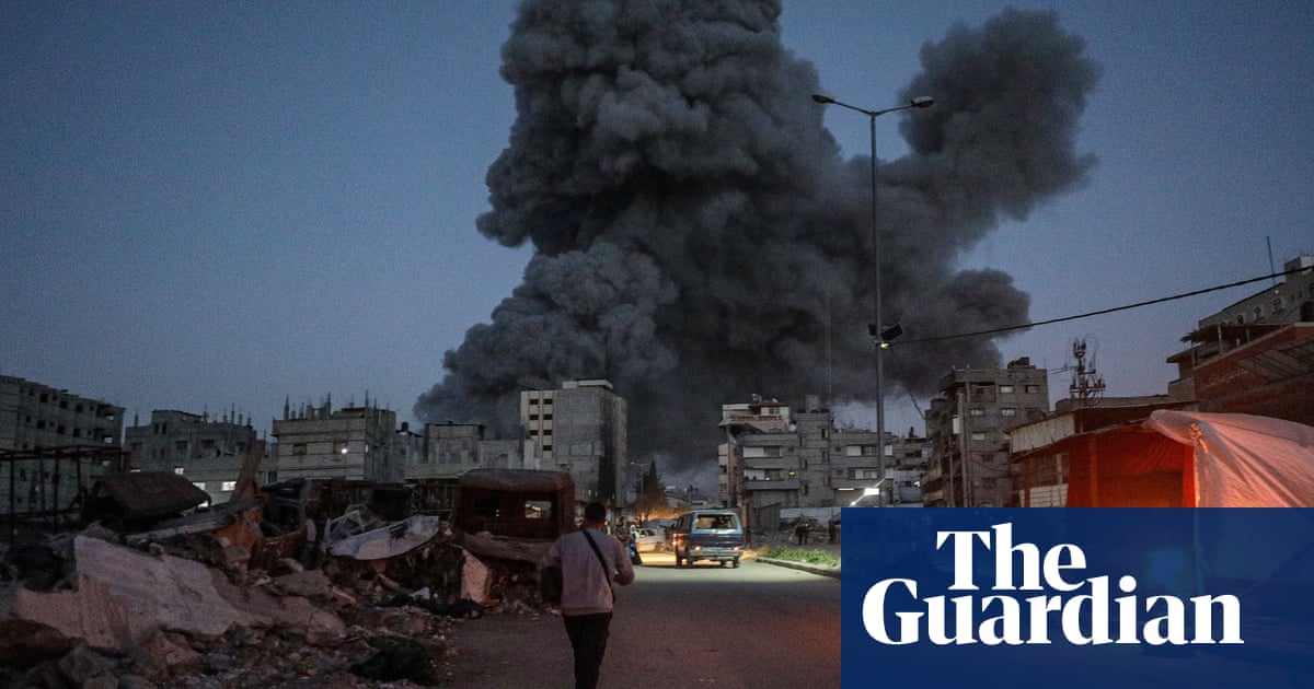 At least 27 killed in Israeli bombing of shelter in Gaza City, rescuers say