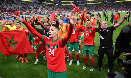 Morocco celebrate in front of their travelling fans.
