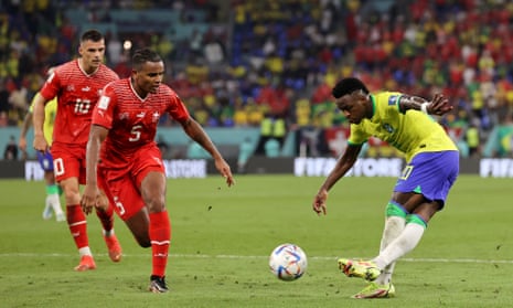 Vinicius Junior of Brazil attempts to put a ball into the box past Manuel Akanji of Switzerland with a rabona.