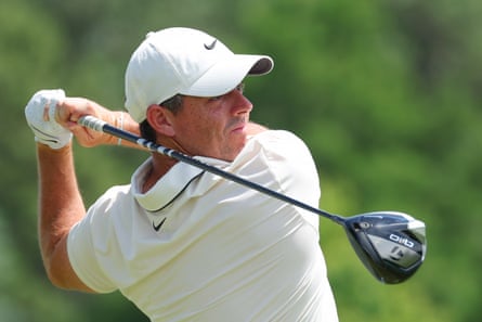 Rory McIlroy watches his tee shot