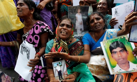 Tamil women holding a protest in Jaffna to remember family members who disappeared during the civil war.