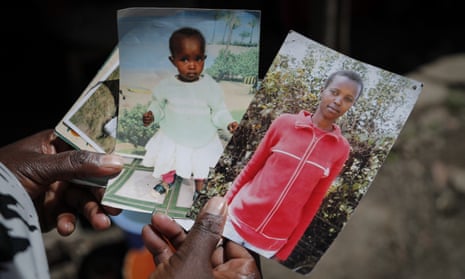 Hands holding photographs of Agnes Wanjiru