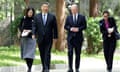 In this photo released by Xinhua News Agency, Chinese President Xi Jinping, second from left, and German Chancellor Olaf Scholz, second from right, walk together in Beijing, China, on Tuesday, April 16, 2024. (Ding Haitao/Xinhua via AP)