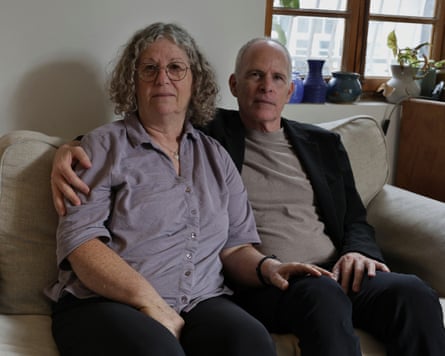 Aviva and Keith Siegel on their home sofa