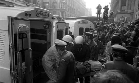 The injured being carried out to ambulances