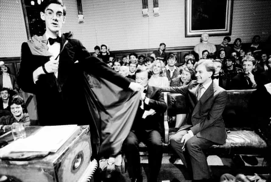 Jacob Rees-Mogg speaks at the Oxford Union Society in 1991. Listening are Kenneth Clarke and John Patten.