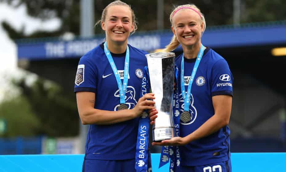 Magda Eriksson and Pernille Harder celebrate with the WSL trophy this month