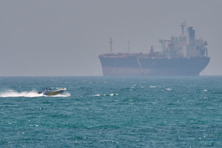 A tanker anchored in the strait of Hormuz off the coast of Iran.