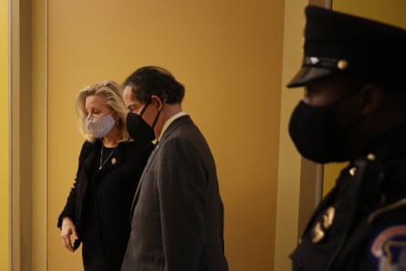 Republican congresswoman Liz Cheney with Democrat Jamie Raskin after the House vote.