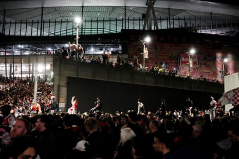 Arsenal fans celebrate at the Emirates