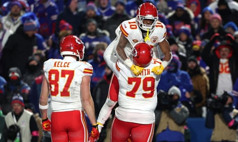 Isiah Pacheco celebrates with Donovan Smith after his crucial touchdown for the Kansas City Chiefs in their playoff victory over the Buffalo Bills