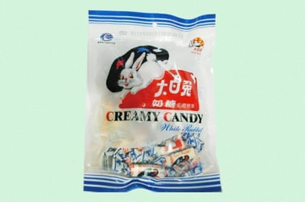 White, blue and red candy bag with a cartoon image of a white rabbit