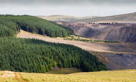 The Hagshaw Hill windfarm above the Spireslack opencast coalmine in Lanarkshire, Scotland,