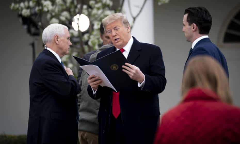 Trump with Mike Pence at the White House on Tuesday. The administration is now reportedly considering easing some of the physical distancing directives.