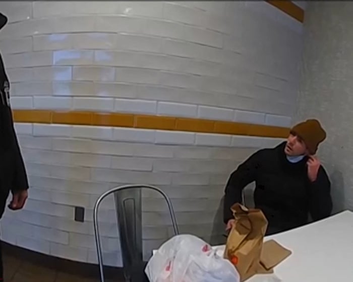 Bodycam footage shows police's initial encounter with Luigi Mangione – video