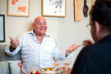 Richard and Joe chatting across a restaurant table